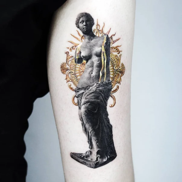 Black & Grey Statue, Sunburst tattoo on Forearm