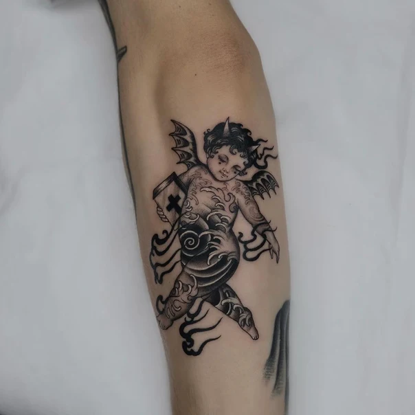 Black & Grey Cherub, Wings tattoo on Forearm