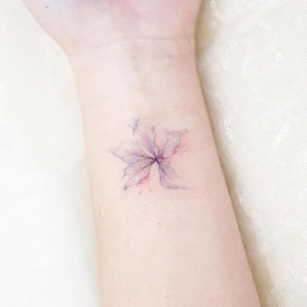 Watercolor Flower tattoo on Wrist