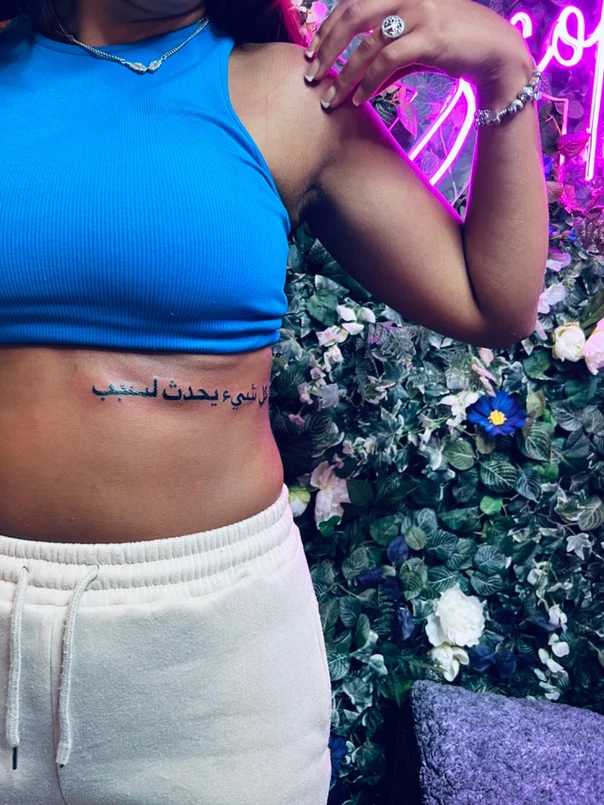 Calligraphy Text tattoo on Side