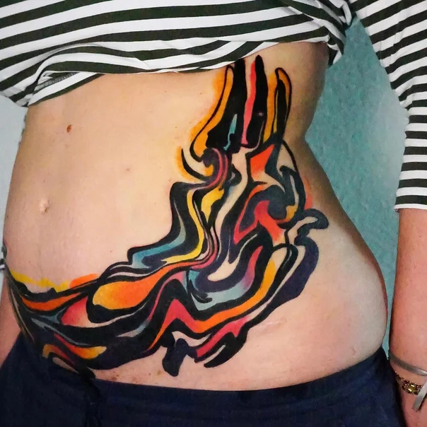 Abstract tattoo on Stomach
