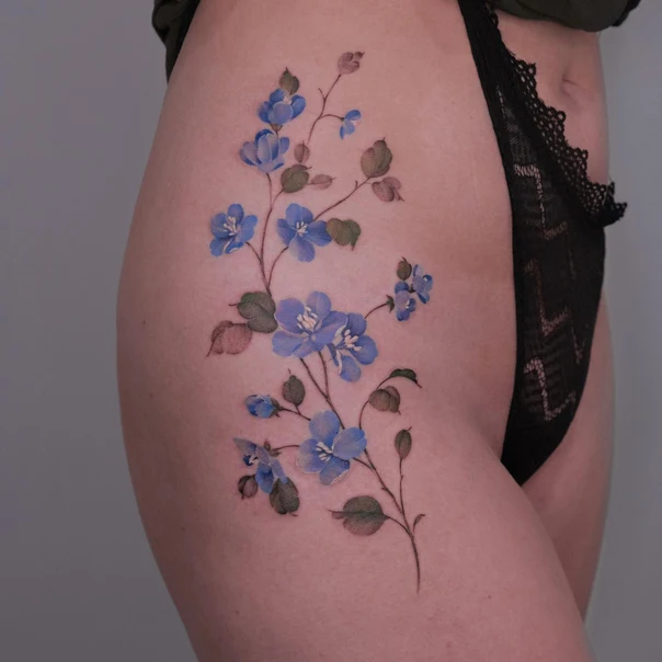 Watercolor Flowers, Leaves tattoo on Thigh