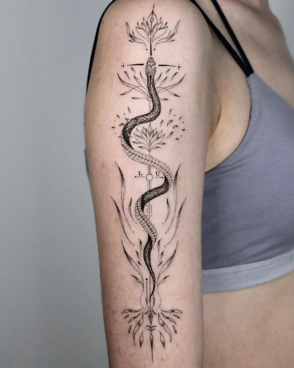 Linework Snake, Botanic tattoo on Upper Arm
