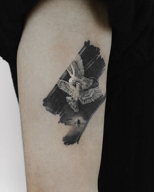 Black & Grey Birds tattoo on Bicep