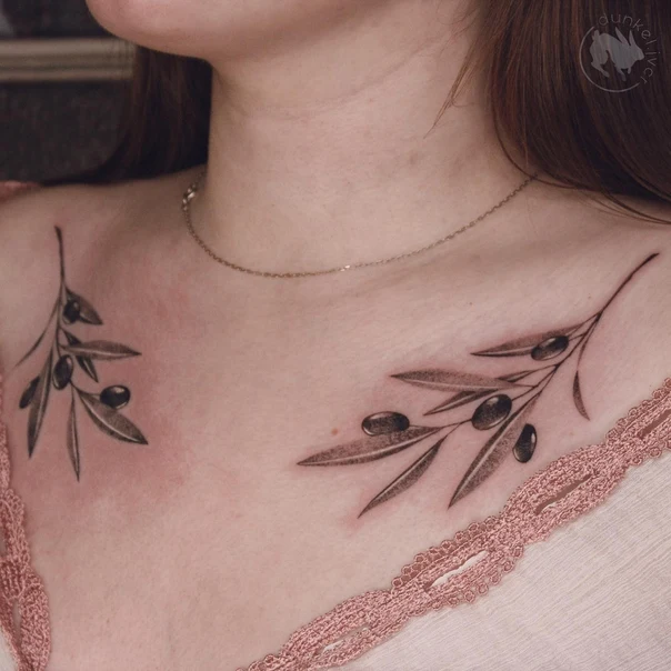 Fineline Olive branch tattoo on Collarbone