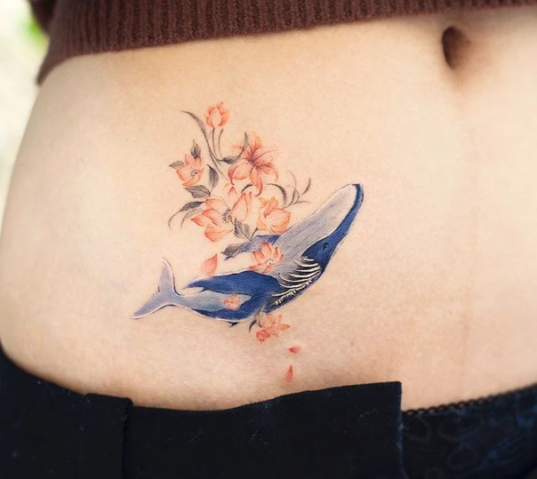 Illustrative Whale, Flowers tattoo on Stomach