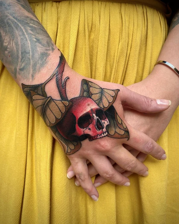 Neo Traditional Skull, Wings tattoo on Back of Hand