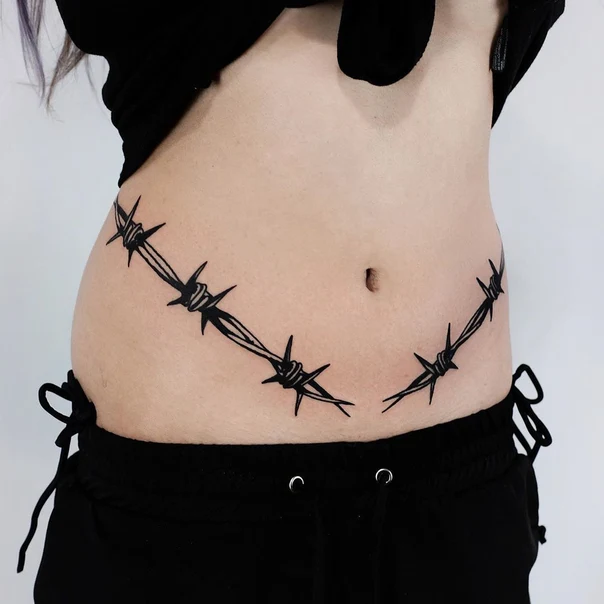 Blackwork Barbed wire tattoo on Stomach