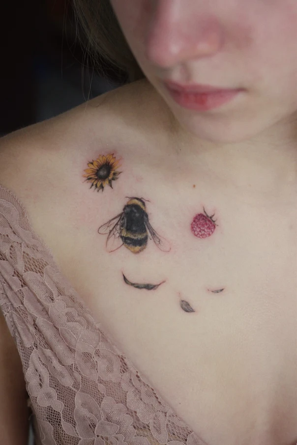 Illustrative Bee, Sunflower tattoo on Collarbone