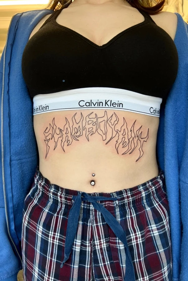 Lettering Text tattoo on Stomach
