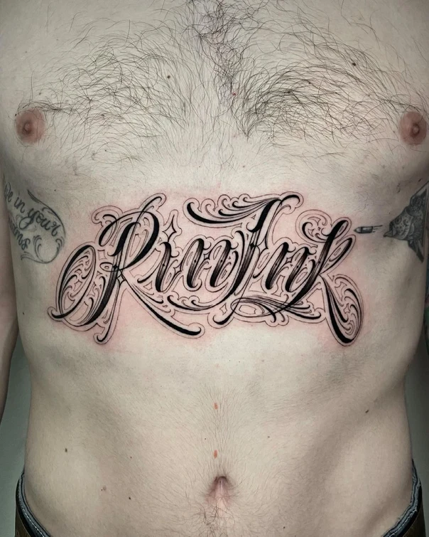 Lettering Lettering tattoo on Chest