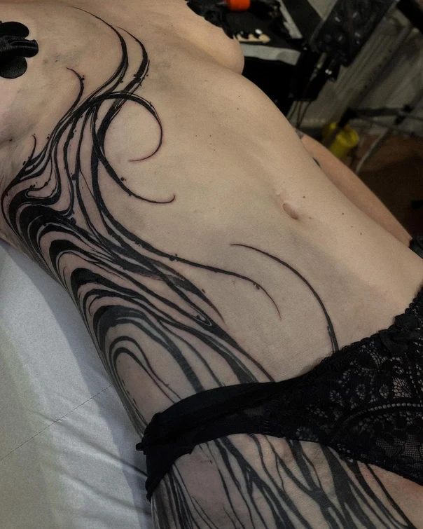 Abstract Abstract tattoo on Stomach