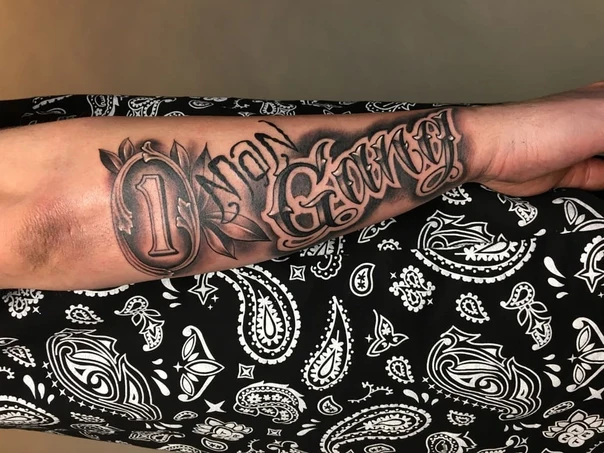 Chicano Number, Lettering tattoo on Forearm