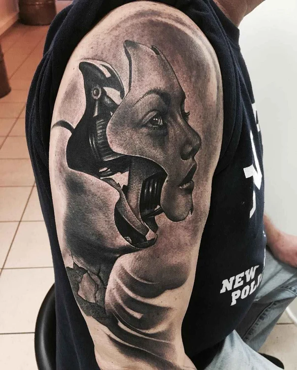 Biomechanical Face, Robot tattoo on Upper Arm