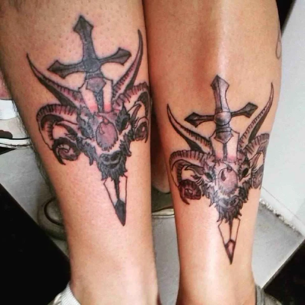 Black & Grey Goat skull, Sword tattoo on Calf