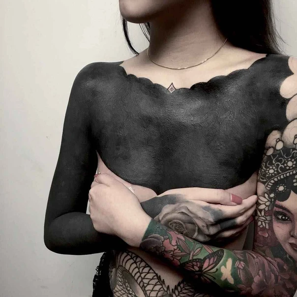 Blackout tattoo on Chest