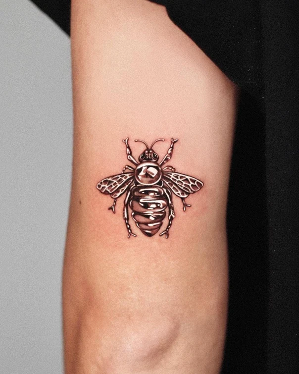 Black & Grey Bee tattoo on Forearm