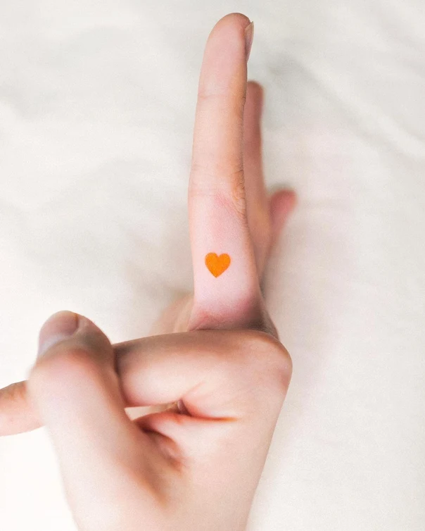 Minimalism Heart tattoo on Finger