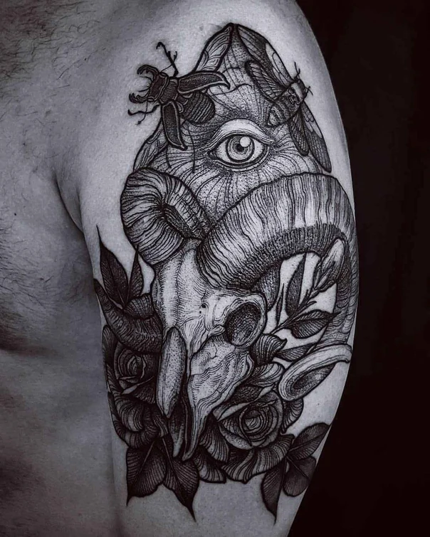 Blackwork Skull, Eye tattoo on Upper Arm