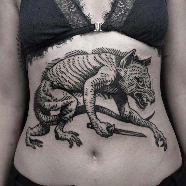 Blackwork Creature, Knife tattoo on Stomach