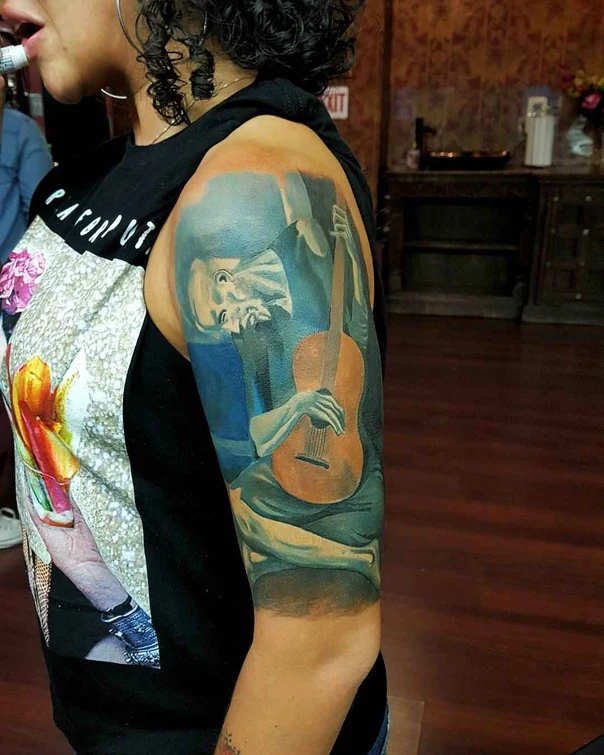 Realism Figure, Guitar tattoo on Full Sleeve