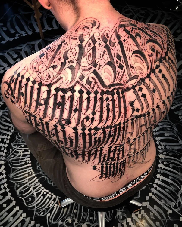 Calligraphy Lettering tattoo on Full Back
