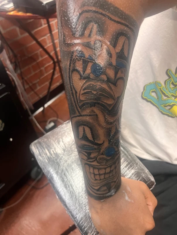 Chicano Clown tattoo on Forearm