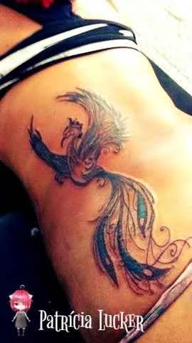 Illustrative Phoenix tattoo on Side