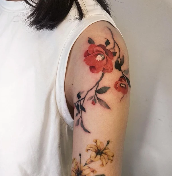 Botanic Flowers, Leaves tattoo on Upper Arm