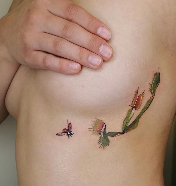 Illustrative Venus flytrap, Insect tattoo on Ribcage