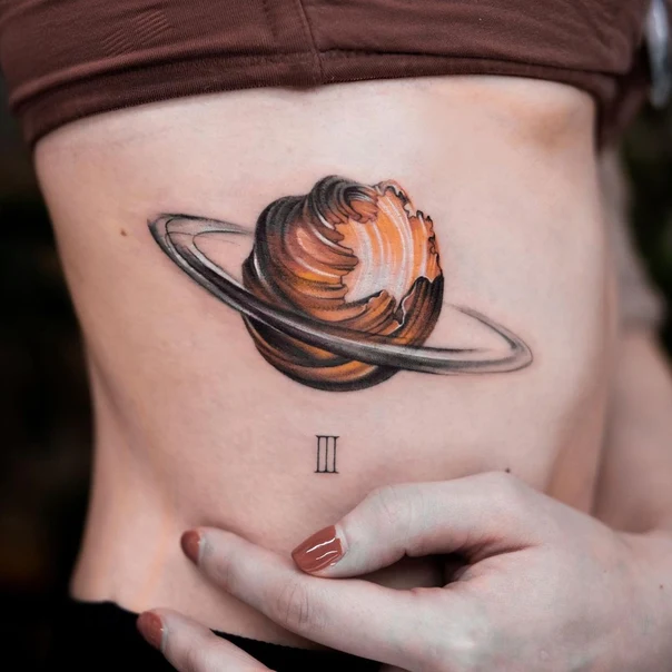 Illustrative Planet, Roman numerals tattoo on Side