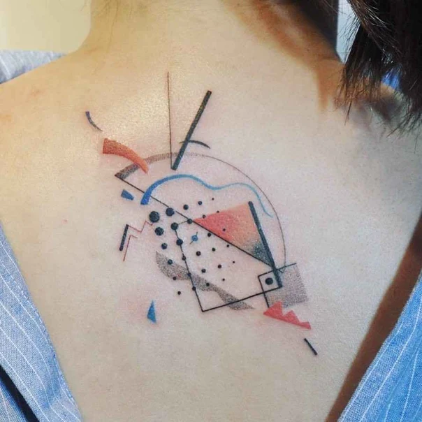 Abstract Geometric shapes tattoo on Upper Back