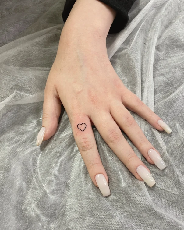 Linework Heart tattoo on Finger