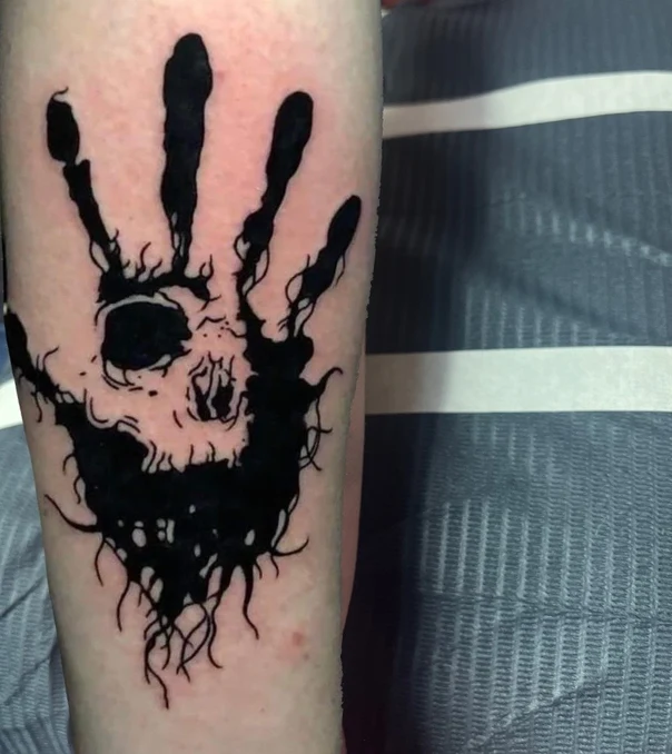 Blackwork Hand, Skull tattoo on Forearm