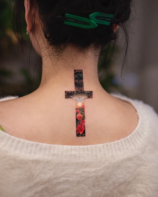 Illustrative Cross, Flowers tattoo on Back of neck