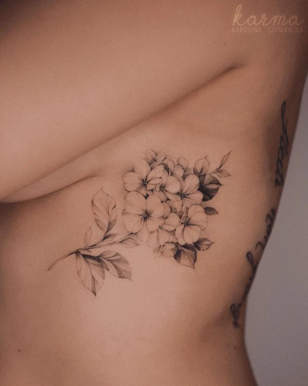 Fineline Flowers, Leaves tattoo on Ribcage