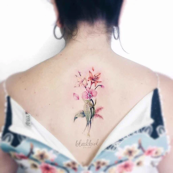 Botanic Flowers tattoo on Upper Back