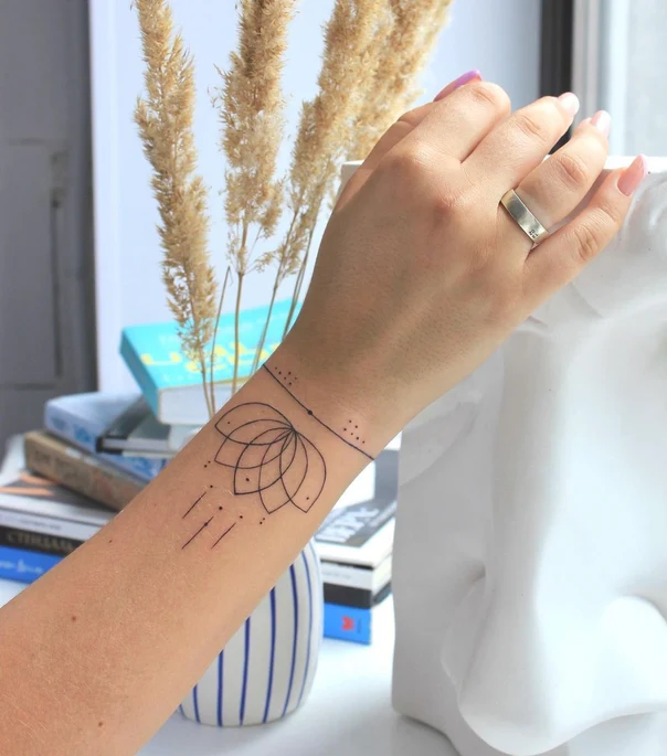 Linework Lotus, Geometric tattoo on Wrist