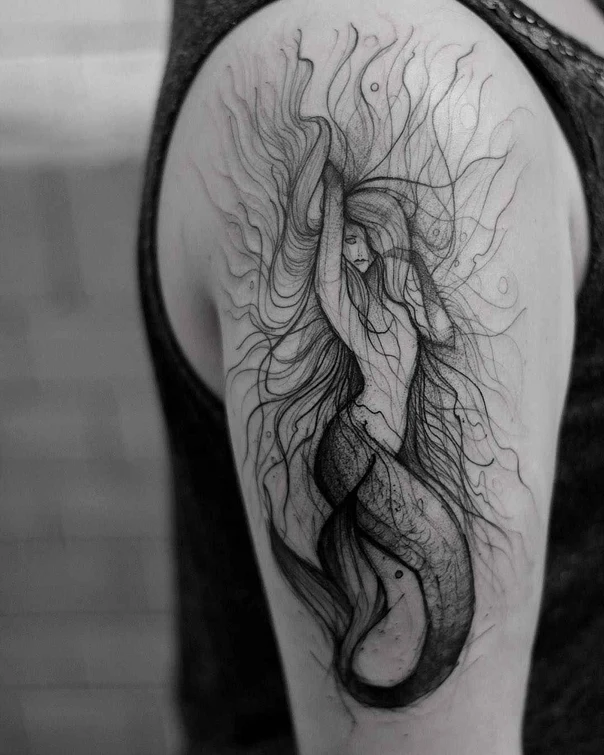 Sketch Mermaid tattoo on Upper Arm