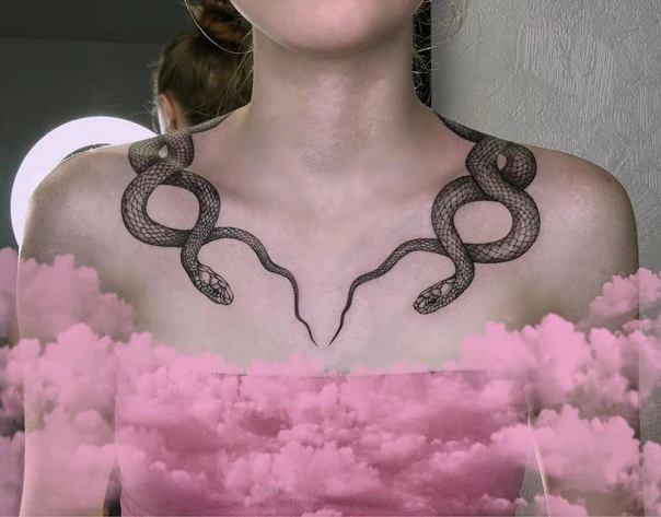 Linework Snake tattoo on Collarbone
