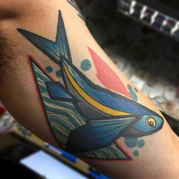 Abstract Fish tattoo on Forearm