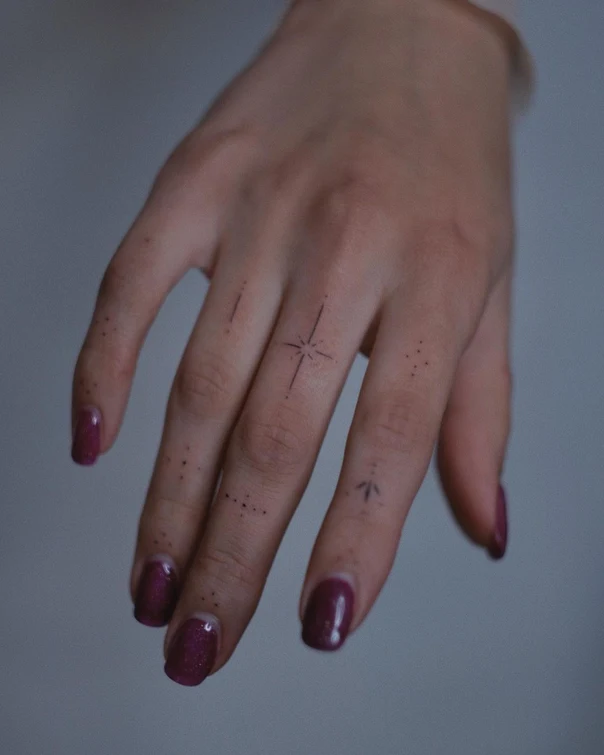 Fineline Star, Dot tattoo on Finger
