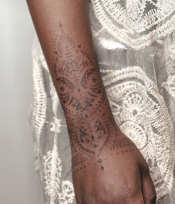Ornamental Mandala tattoo on Wrist