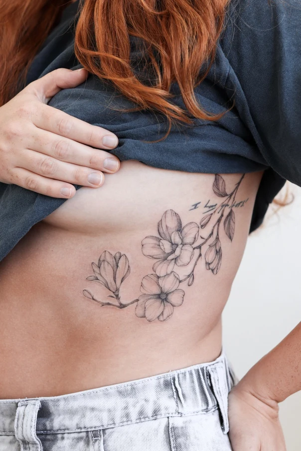 Fineline Flowers, Botanical tattoo on Ribcage