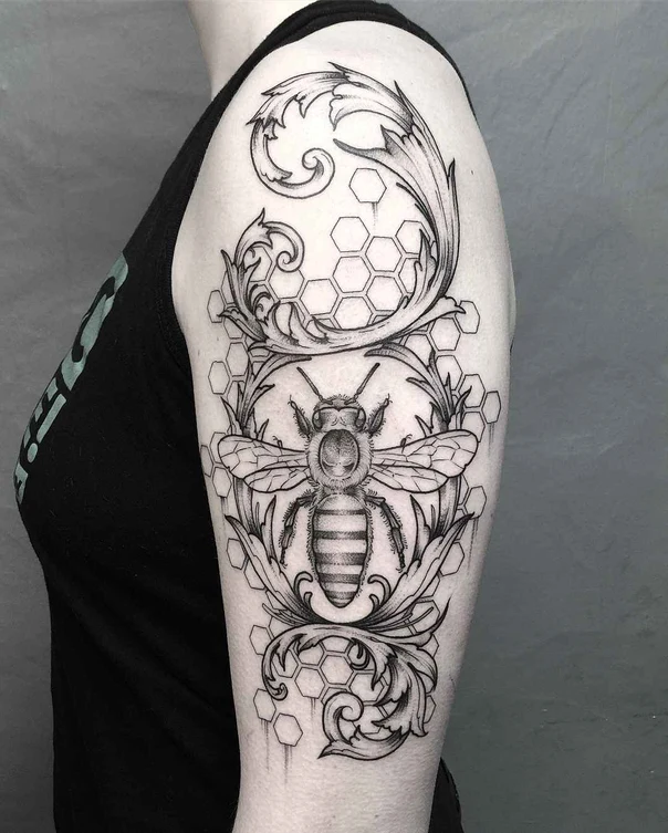 Blackwork Bee, Honeycomb tattoo on Upper Arm