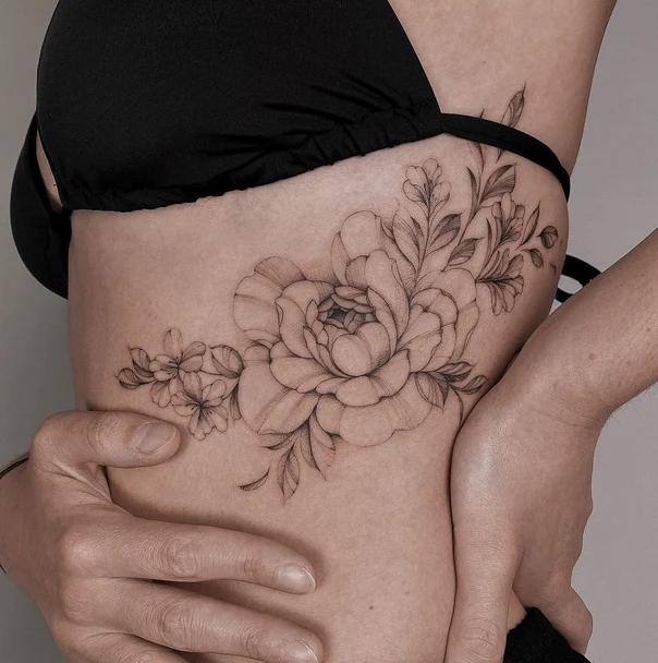 Fineline Flower, Leaves tattoo on Ribcage