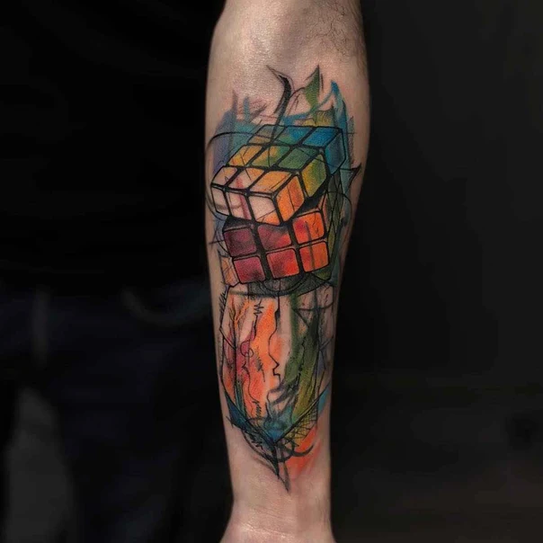 Abstract Rubik's cube tattoo on Forearm