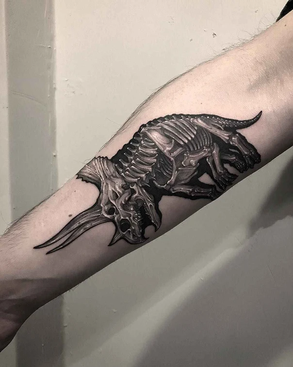 Biomechanical Dinosaur, Skeleton tattoo on Forearm