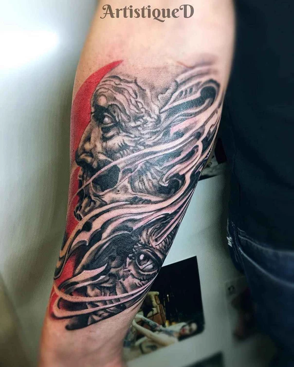 Biomechanical Skull, Eye tattoo on Forearm