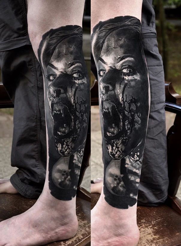 Black & Grey Face tattoo on Calf